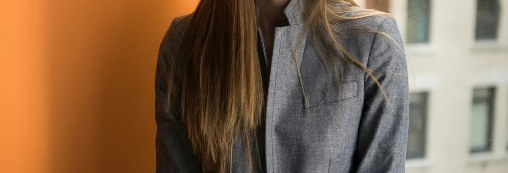 Person climbing stairs, symbolizing growth